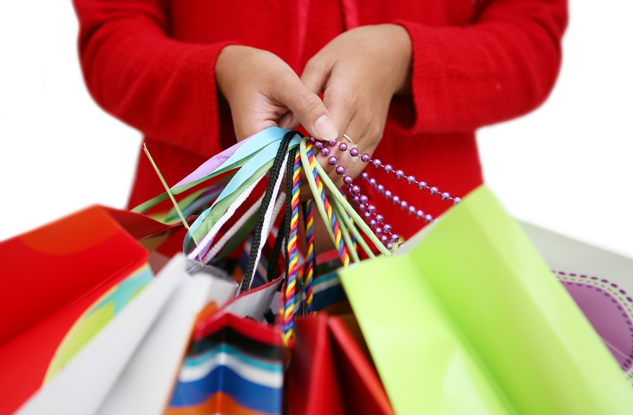 No Title woman holding bags during the holiday shopping season